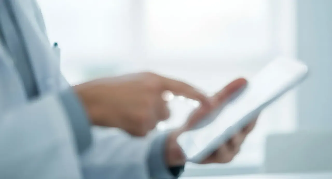A healthcare professional using a secure clinical software platform.